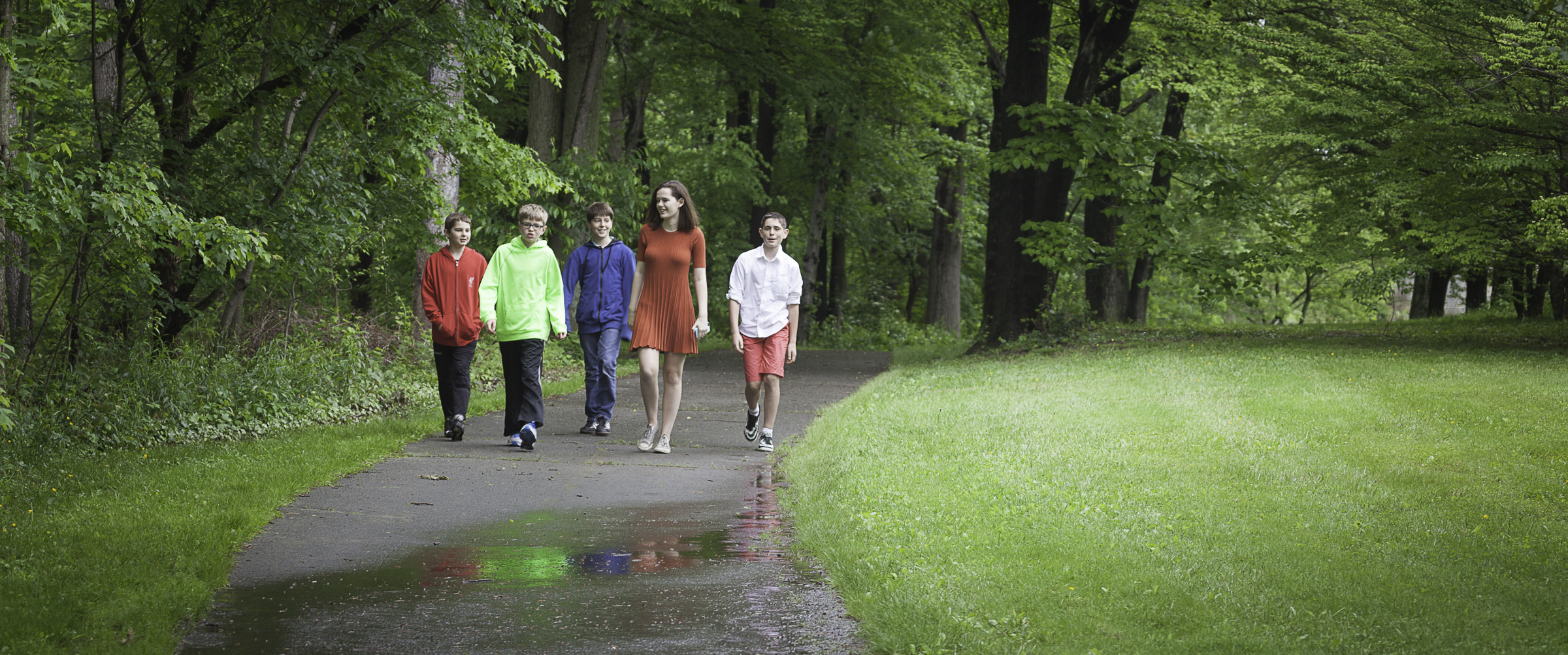 teacher and students walking