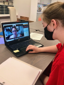 High School student at The Sycamore School in Arlington, Virginia, working one-on-one with their school counselor.