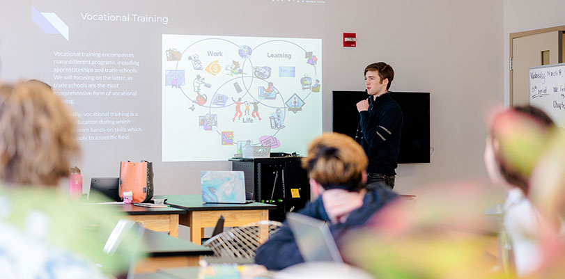 Sycamore School student giving a presentation