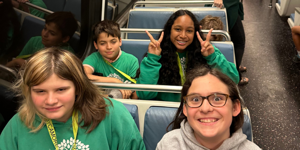 Students riding metro to field trip